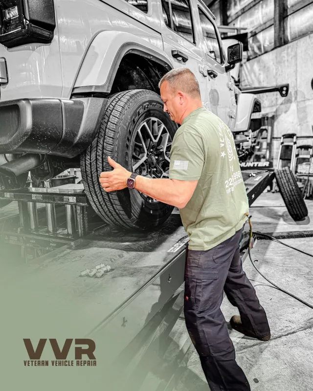 Mike installing a tire in the shop